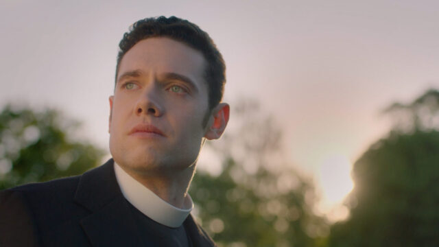 Tom Brittney looking beyond the camera in Grantchester Season 8